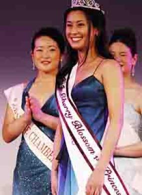 Color image of Seena Akita with sash and crown as Cherry Blossom Festival First Princess